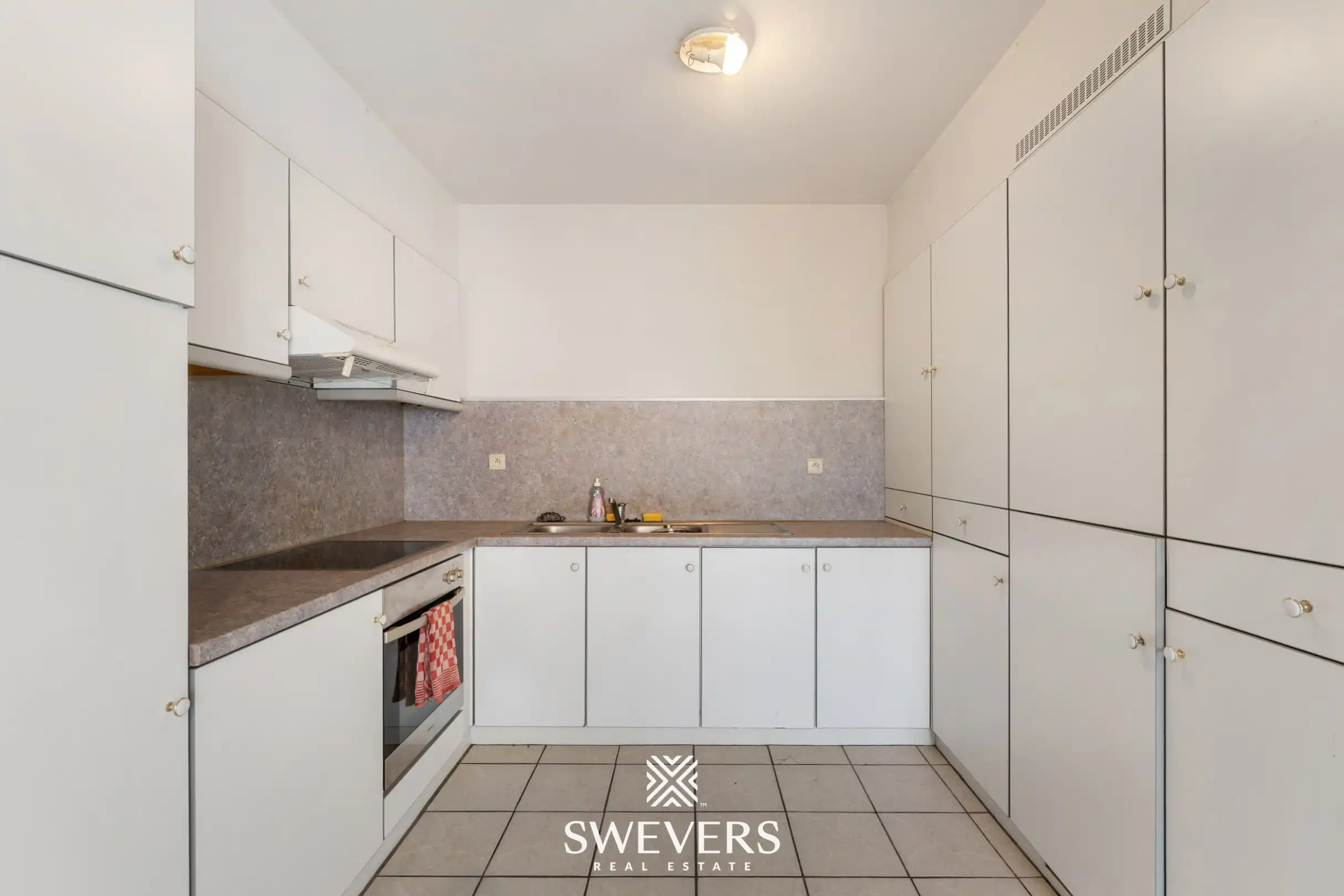 Appartement met 2 slaapkamers, terras en garagebox nabij centrum Beringen foto 10