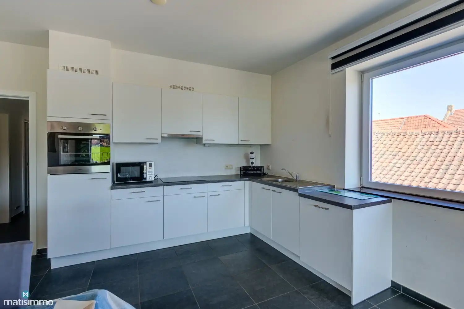 INSTAPKLAAR APPARTEMENT MET 2 SLAAPKAMERS EN AUTOSTAANPLAATS TE RIEMST foto 6