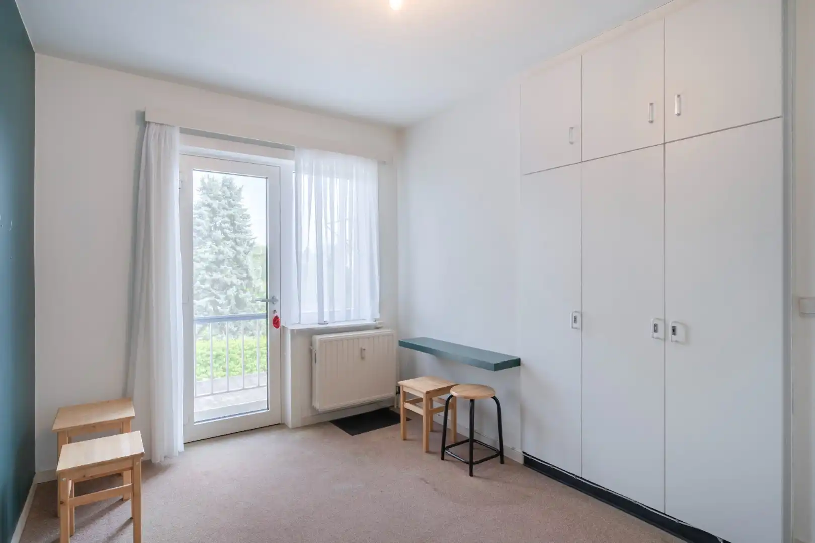 Ruim appartement op de 3° verdieping in hartje Hoeselt, met 3 slaapkamers, garage en prachtig terras met panoramisch uitzicht.  foto 25