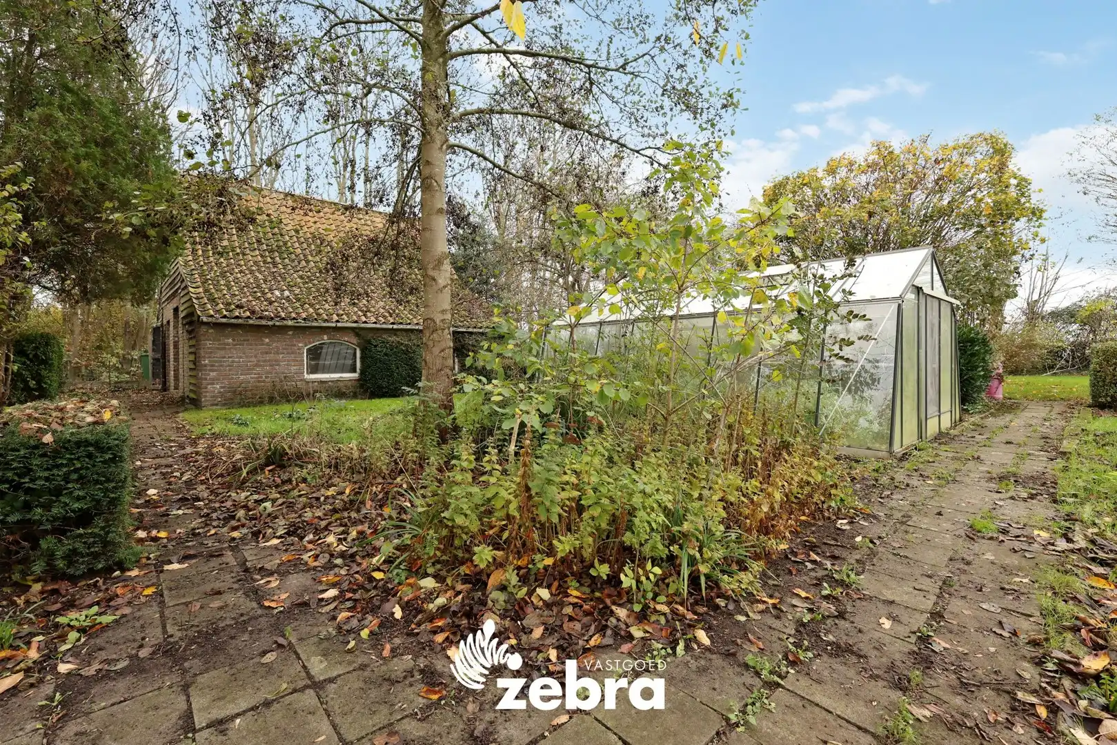 Ruime, energiezuinige woning met grote tuin, zwemvijver en schuur in Beveren aan de IJzer! foto 26