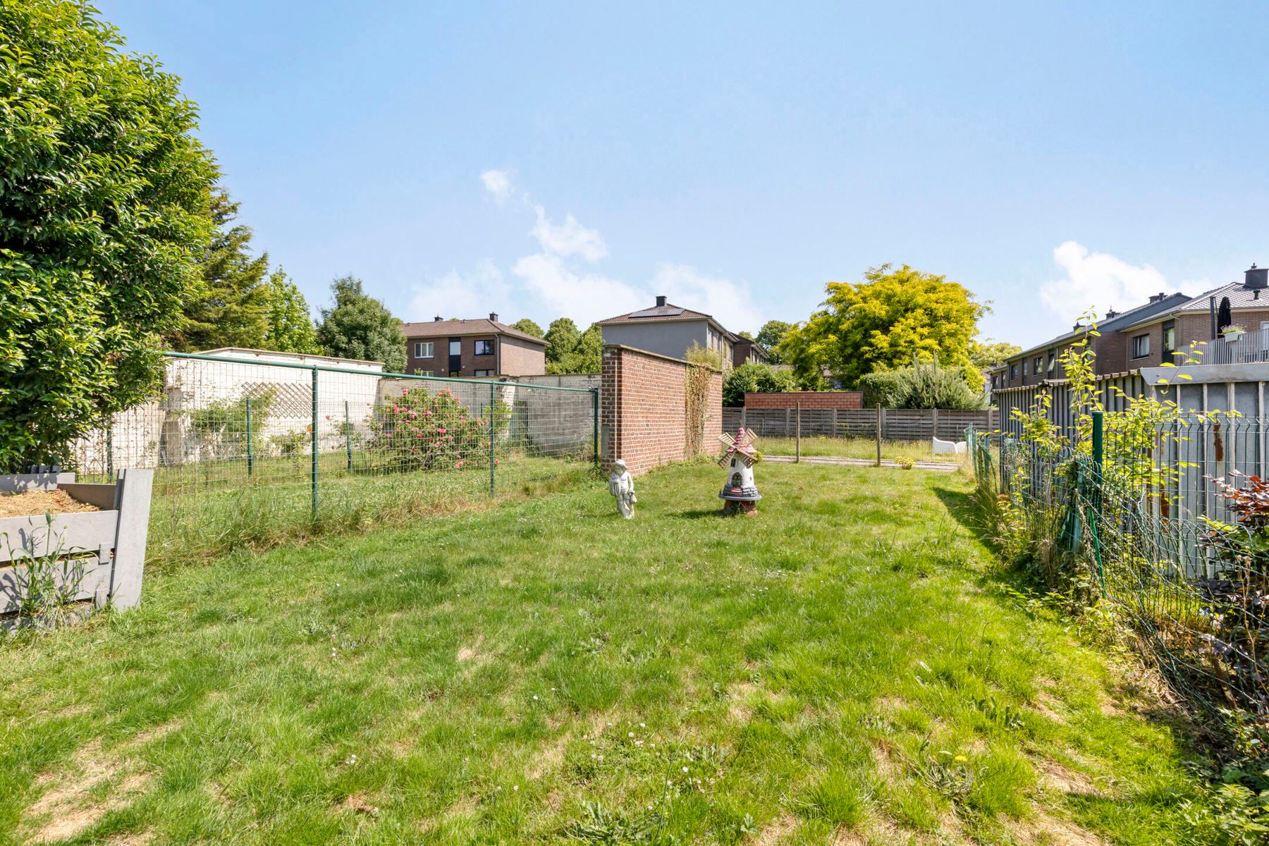 Opbrengsteigendom centrum Meise met 3 appartementen & tuin! foto 12