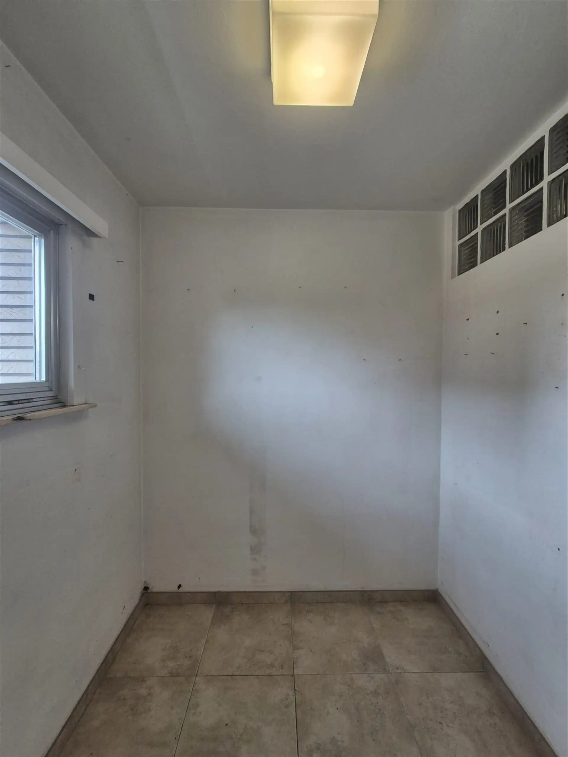 Centraal gelegen ruim appartement met groot zongericht terras en garage. foto 25