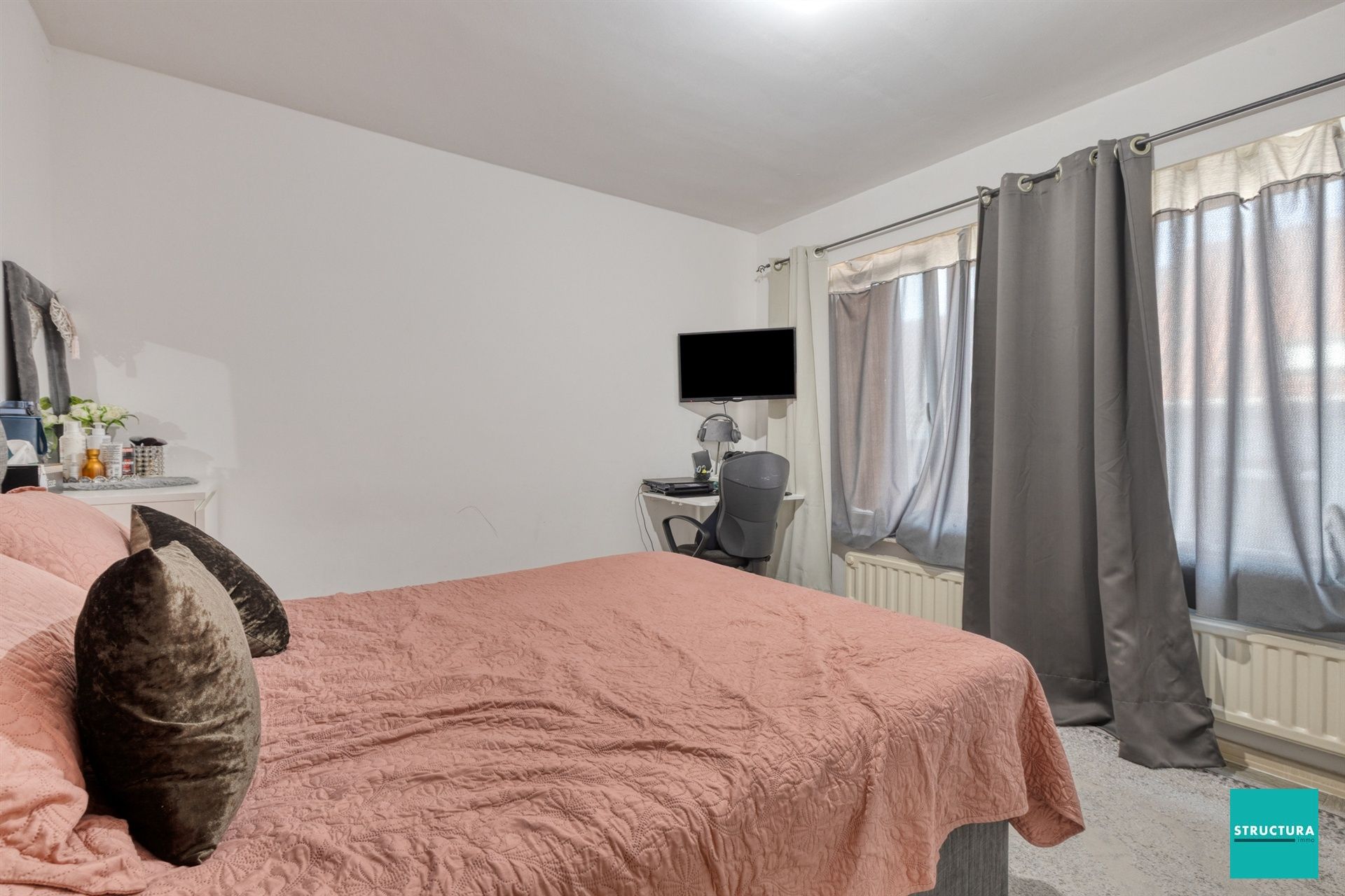 Opbrengsteigendom met 2 appartementen + 6 autostallingen foto 10
