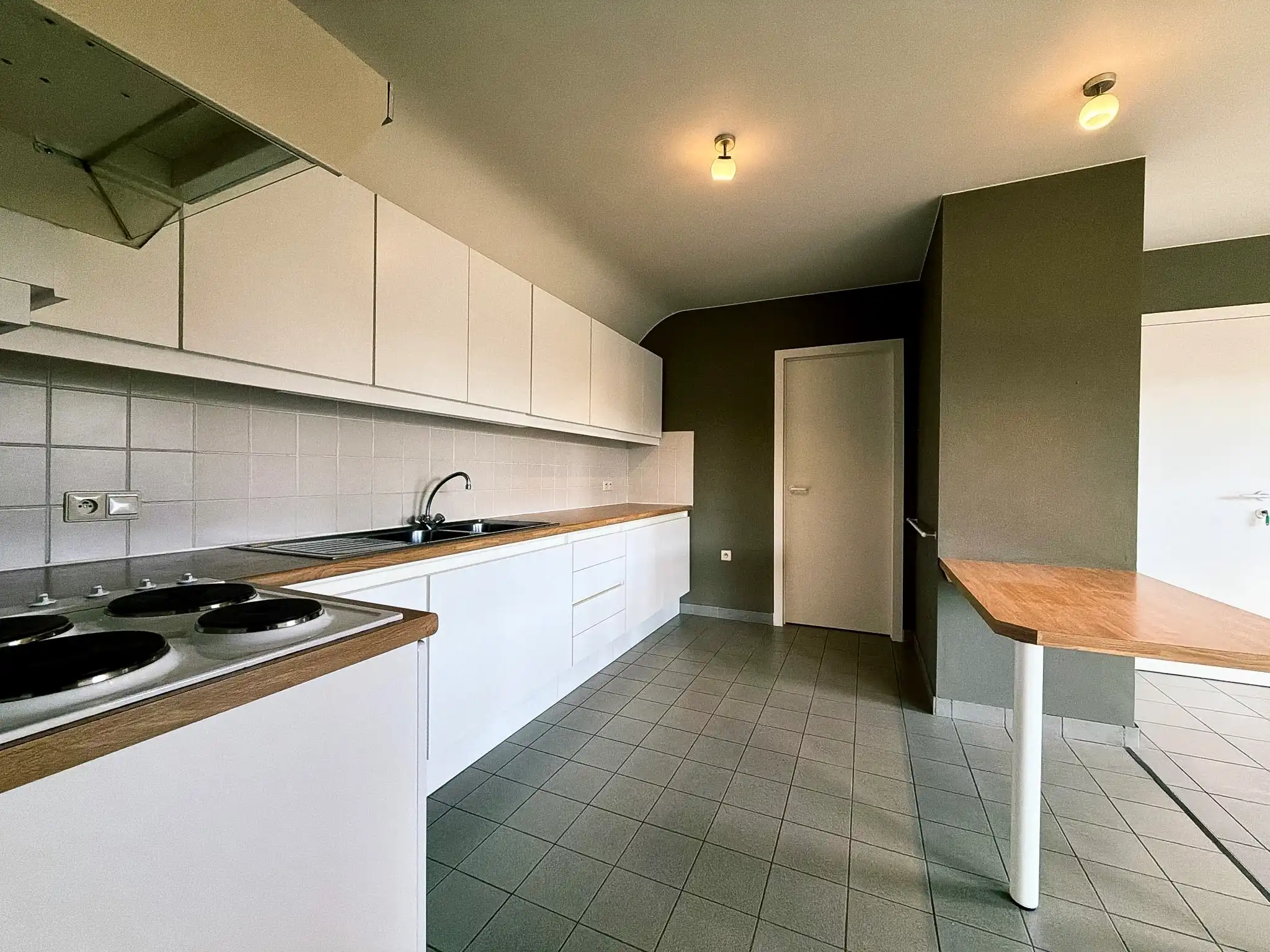 Centraal gelegen 1-slpk appartement te huur in Wetteren foto {{pictureIndex}}
