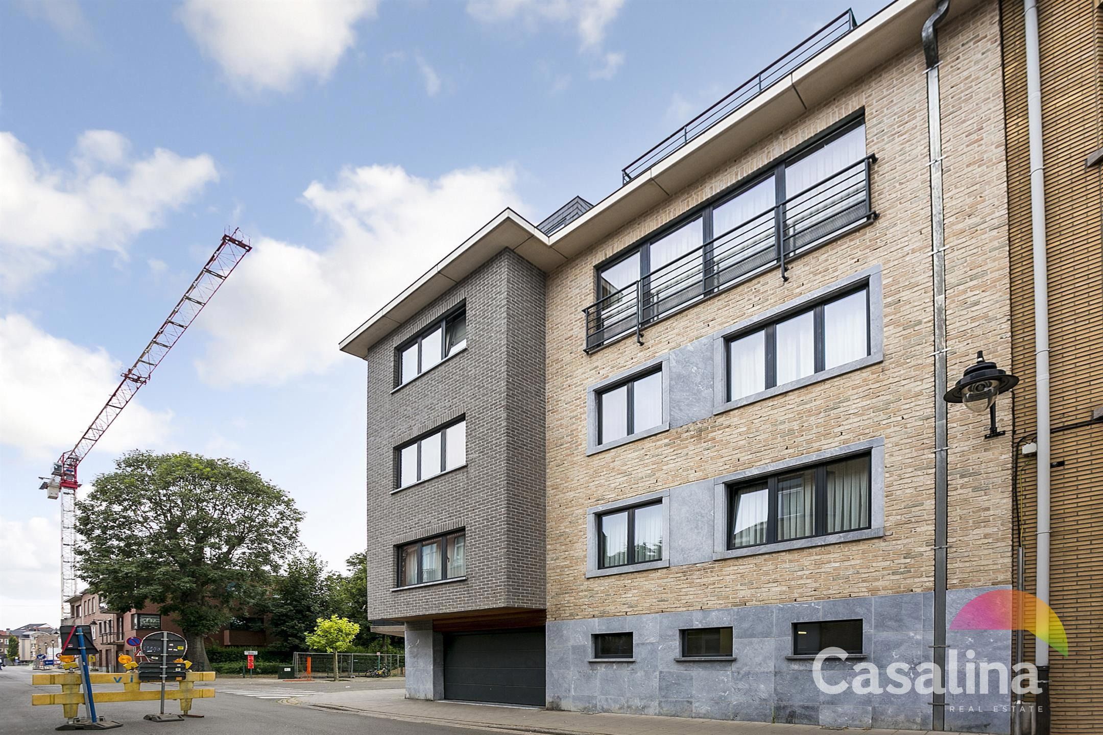 Moderne duplex 95m² met terras, parking en kelder foto 29