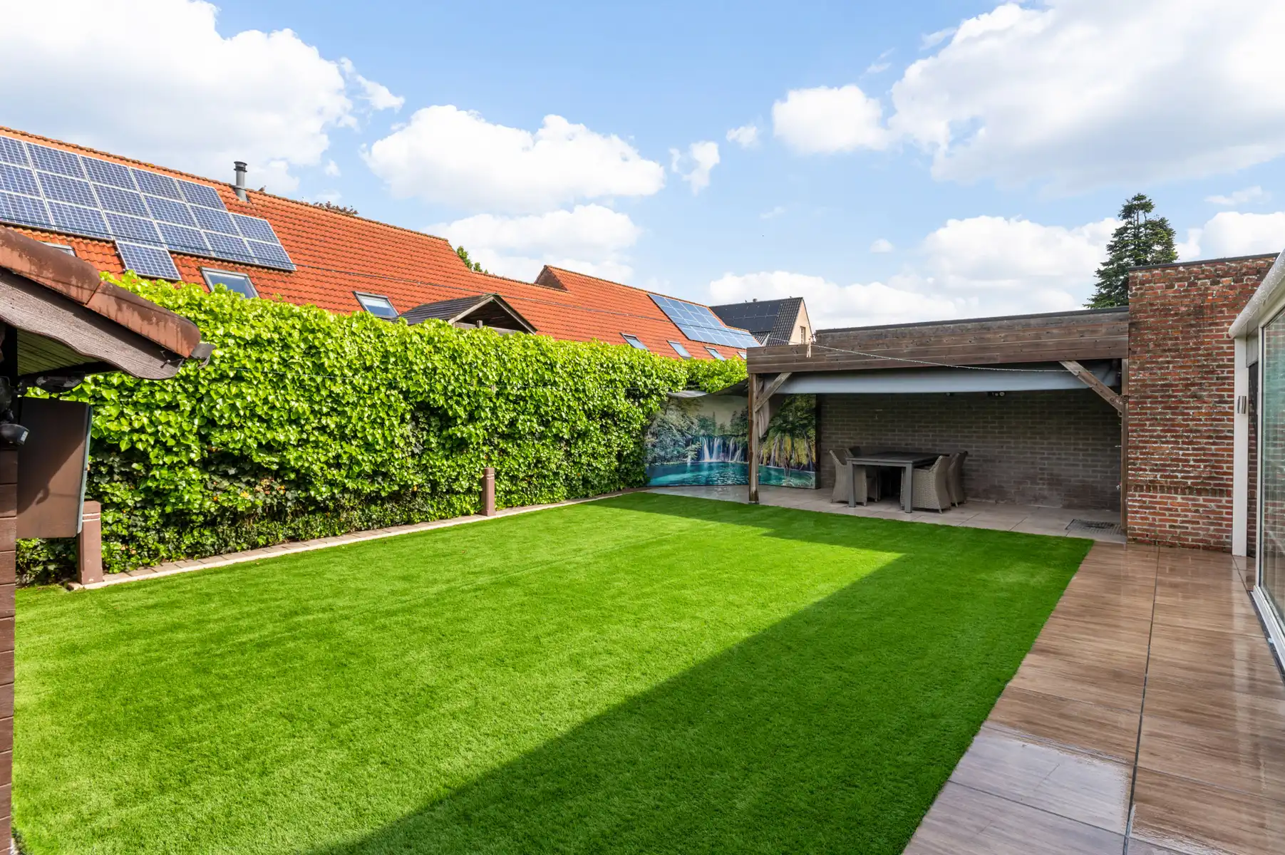 Ruime woning met 4 slpks, 2 bdks, garage en tuin foto 27