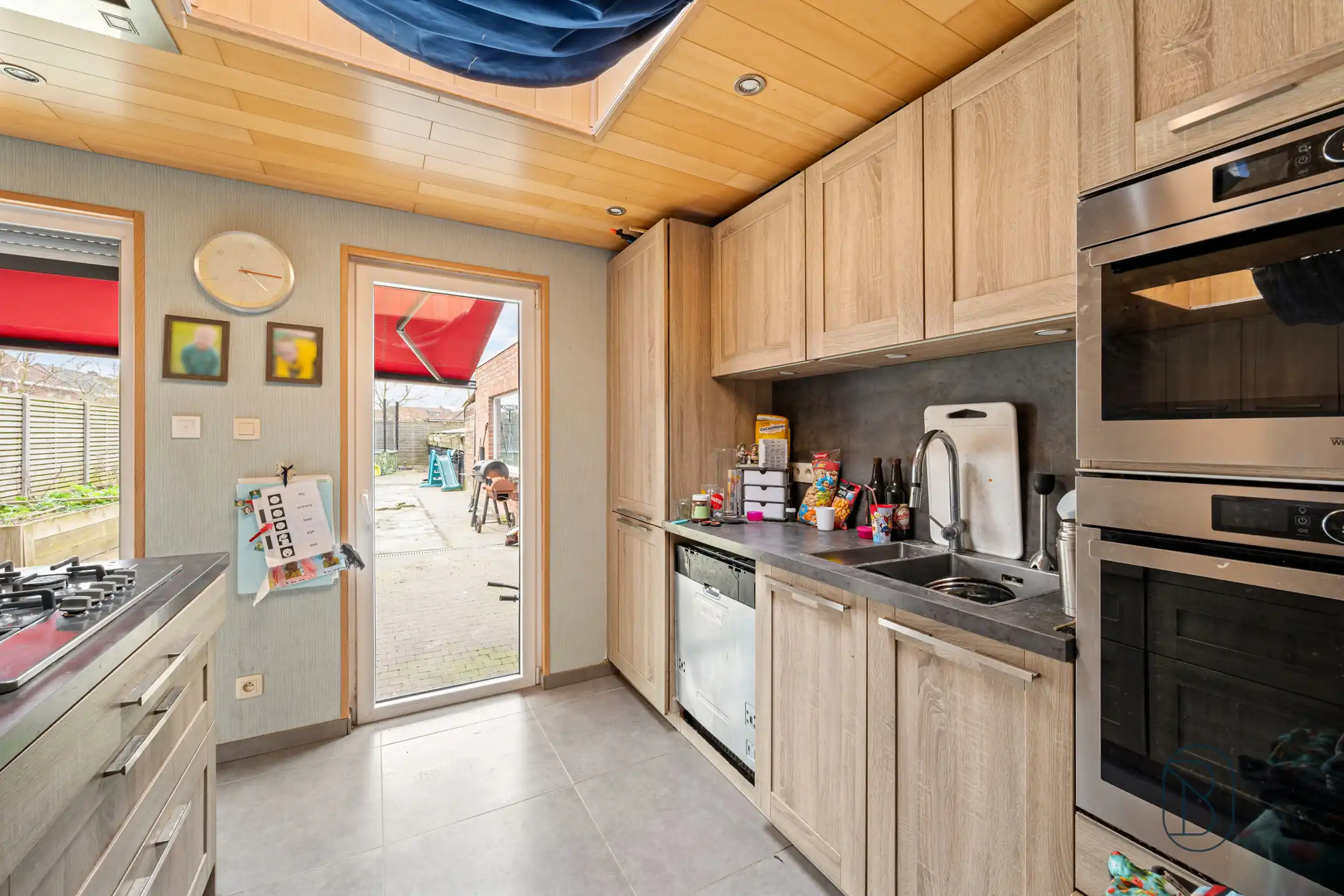 Halfopen woning met garage en tuin in Harelbeke foto 9