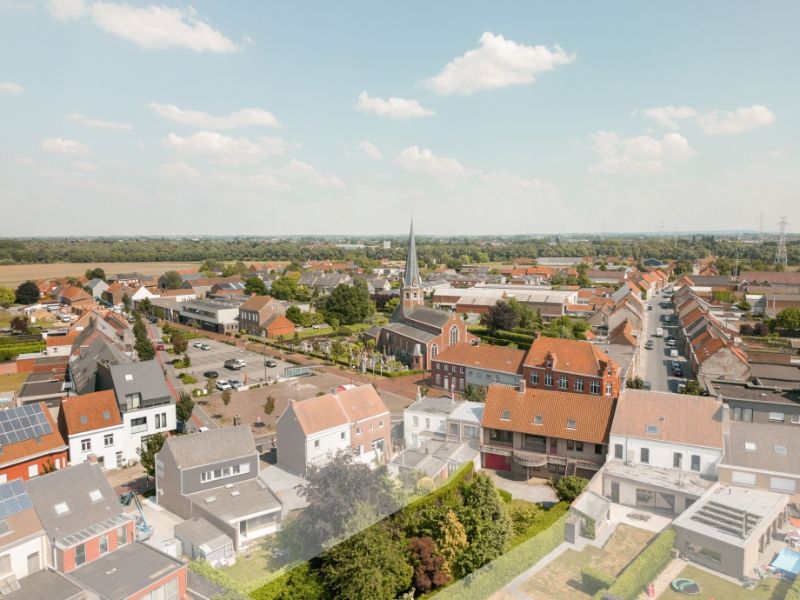 Centraal gelegen gebouw met gelijkvloerse handelsruimte, appartement met terras, extra verdieping en grote tuin foto 11