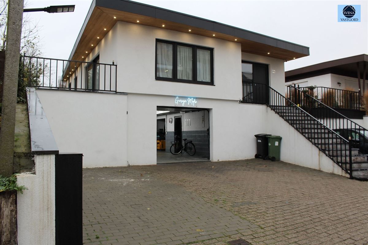 WONING MET HANDELSRUIMTE EN 3 SLAAPKAMERS foto {{pictureIndex}}