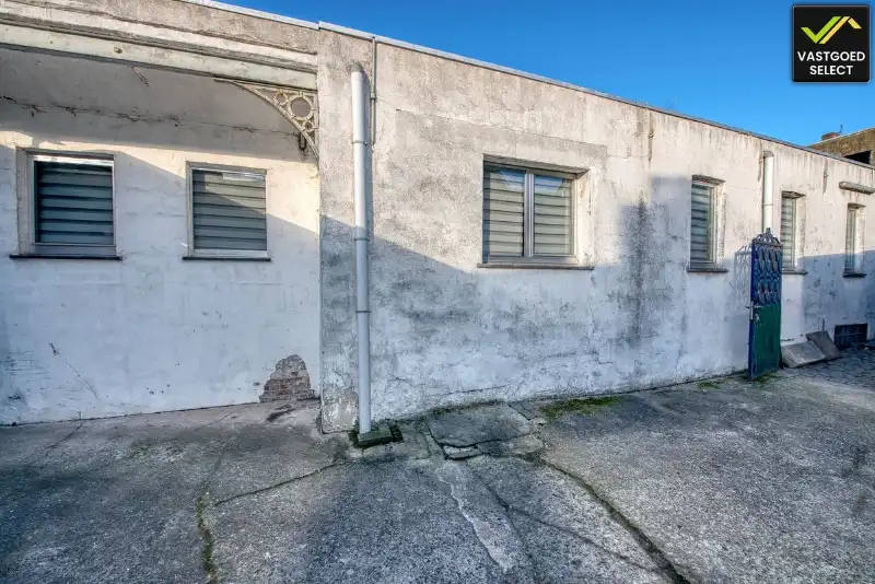 Statige herenwoning met bijgebouw, garage­mogelijkheden en patio in centrum Eeklo foto 19