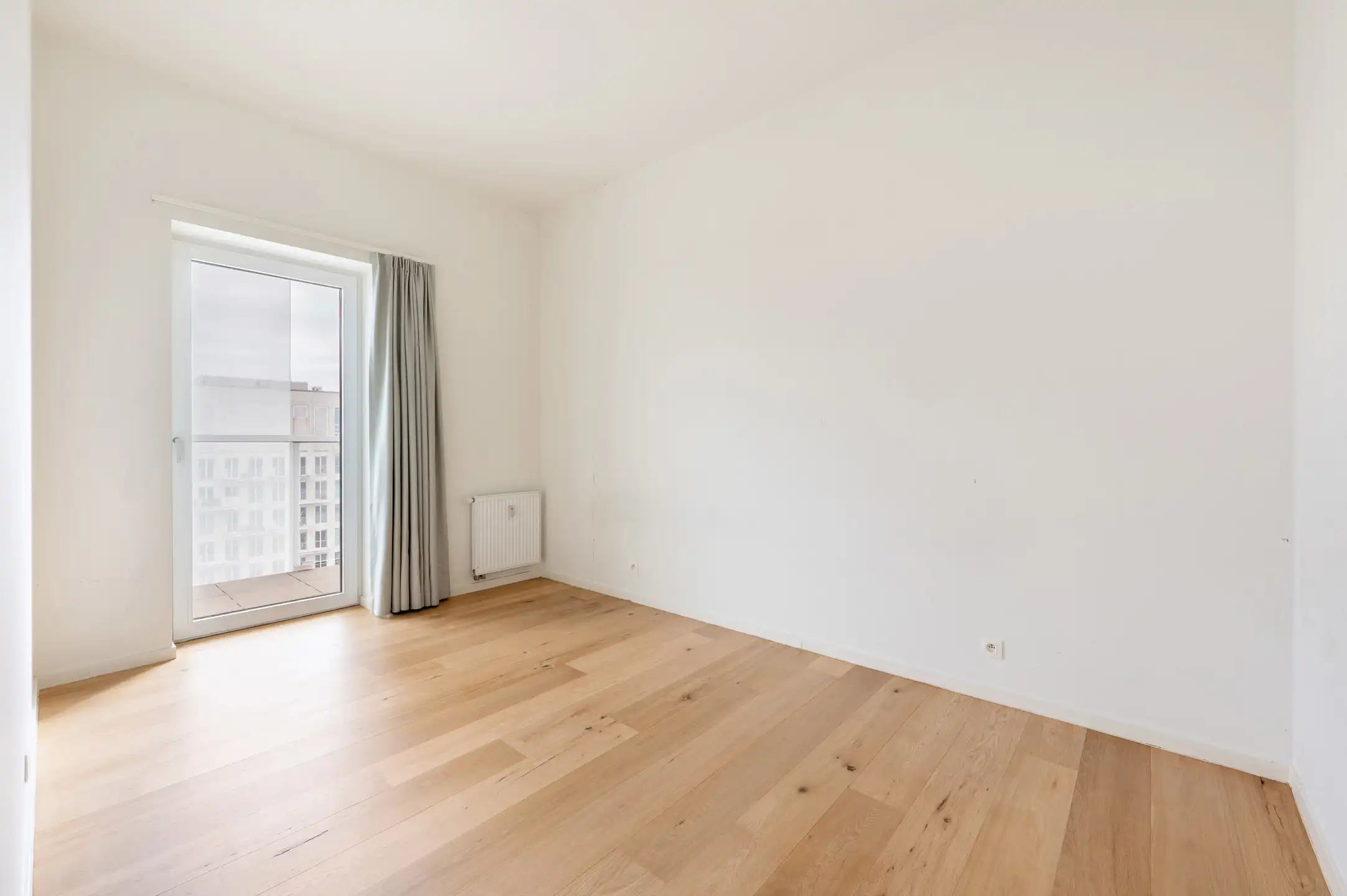 Lichtrijk appartement met terras en EPC A foto 11