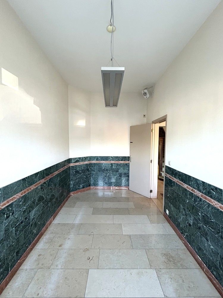 Rijwoning met veel potentieel in centrum Kessel-Lo foto 3