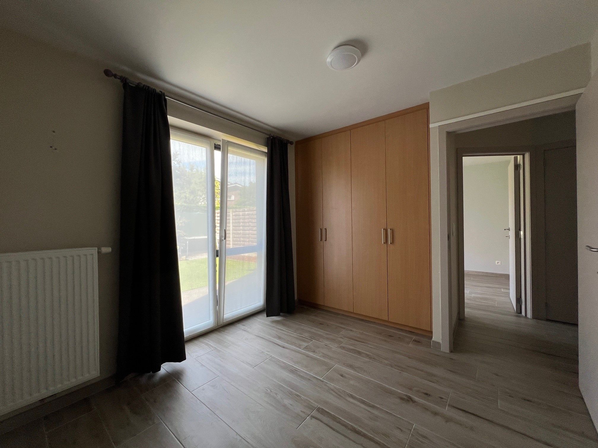 Instapklaar gelijkvloers appartement met 2 slaapkamers en tuin. foto 8