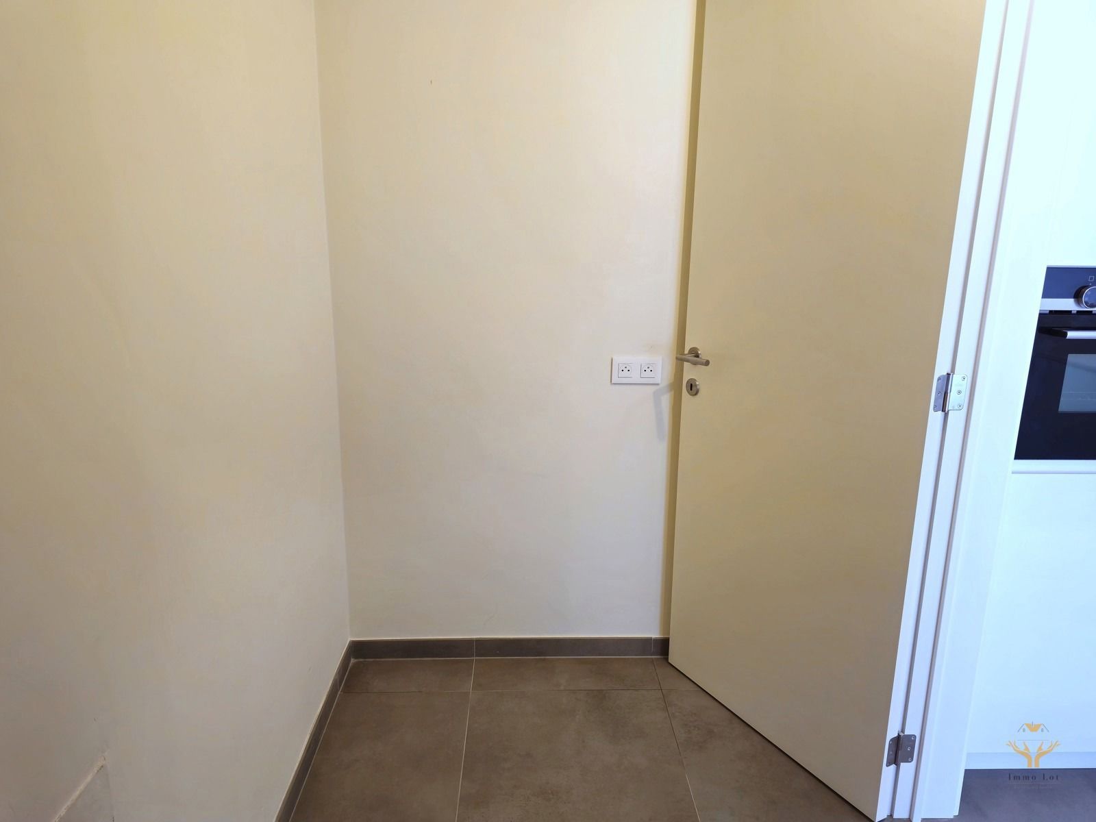 Lichtrijk 1-slaapkamerappartement met groot terras en ondergrondse garage foto 6