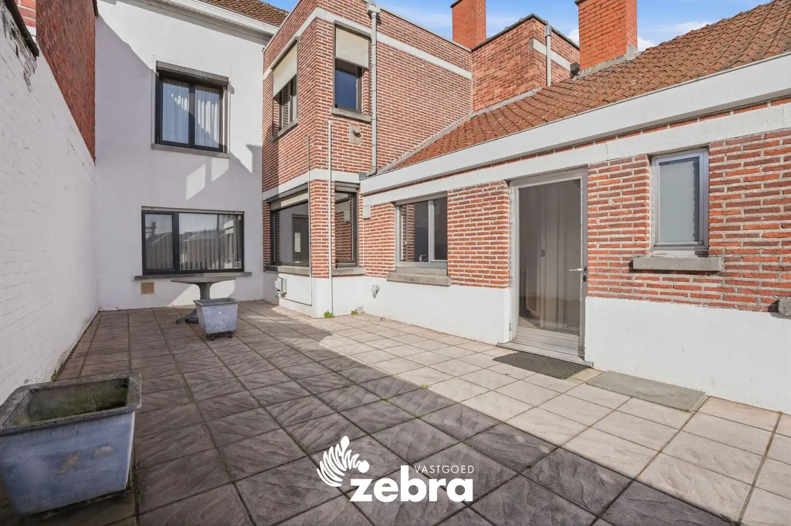 Op te frissen woning met veel potentieel, tuin en garage nabij het centrum van Tielt! foto 24