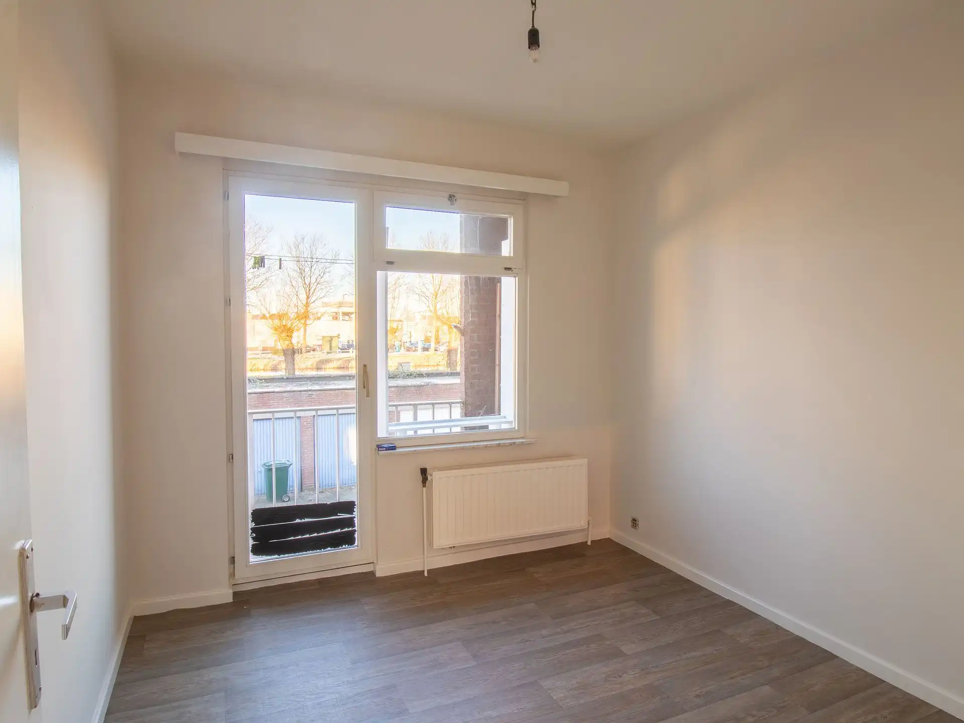 Ruim 2 slaapkamer appartement met garage en zicht op water foto 9