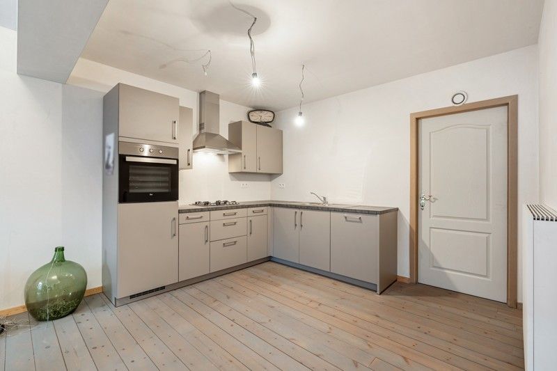 Woonappartement met handelsruimte in het centrum van Wommersom foto 14