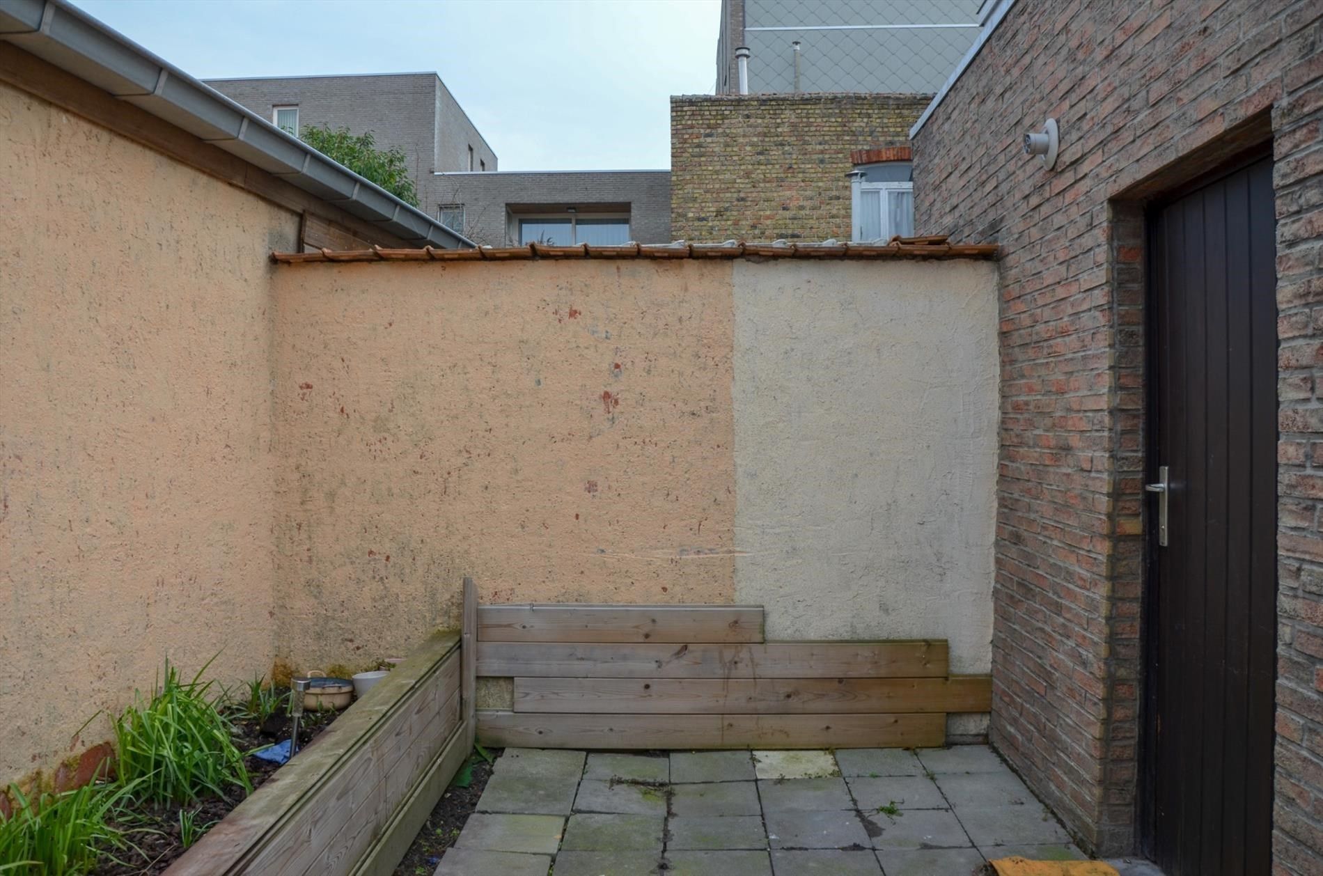 Hoekwoning met 2 slaapkamers en koertje. foto 15