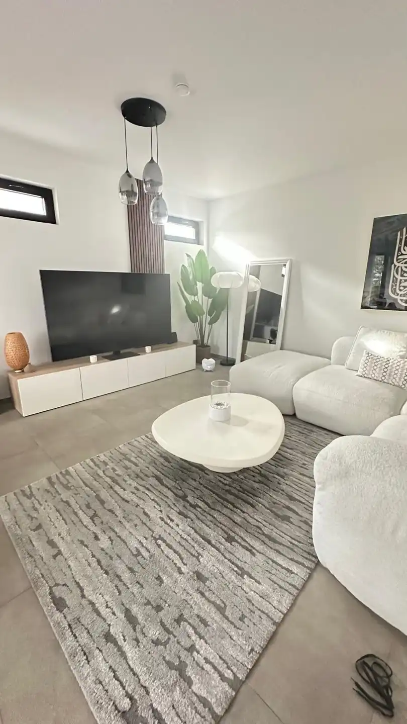 Modern nieuwbouwappartement met terras te huur foto 4