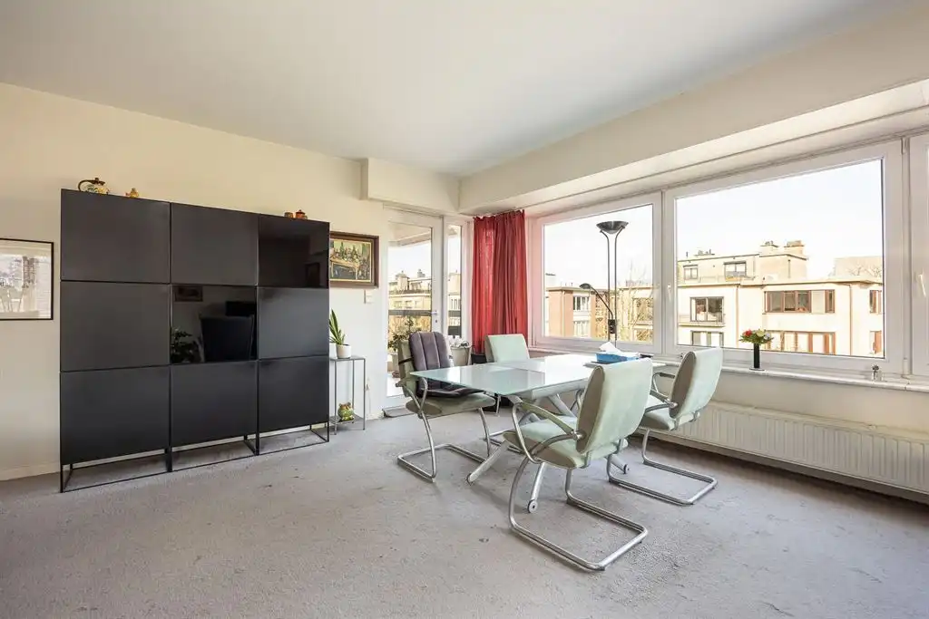 Groot hoekappartement met bijzonder veel lichtinval op de 3e verdieping foto 4