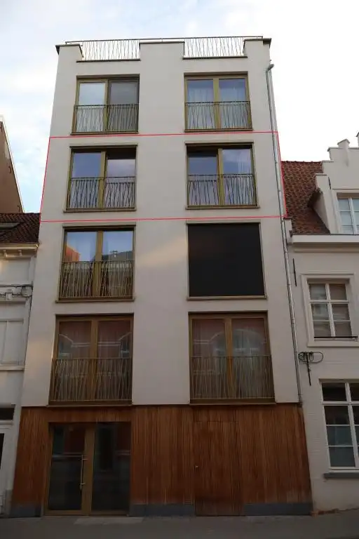 Modern appartement met 1 slaapkamer in het hart van Leuven - te huur! foto {{pictureIndex}}