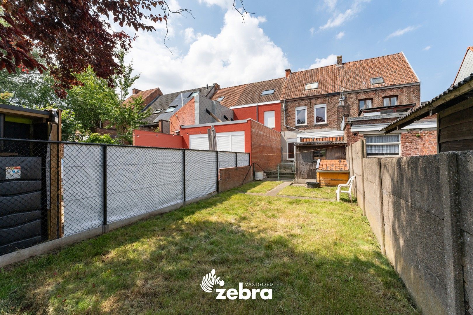 Gesloten bebouwing met zonneterras en tuin, vlakbij centrum Roeselare! foto 12