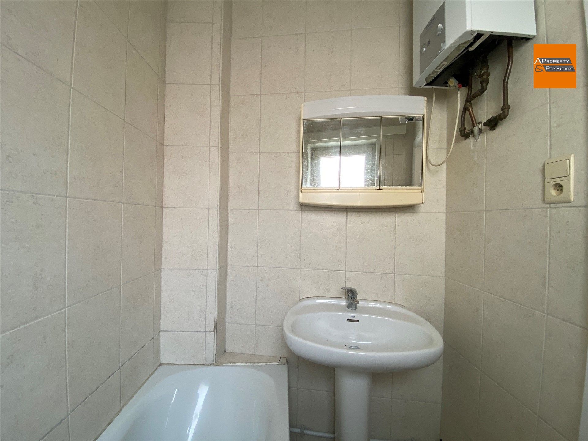 Aangenaam en gezellig appartement met 2 slaapkamers nabij het centrum van Tienen.  foto 22