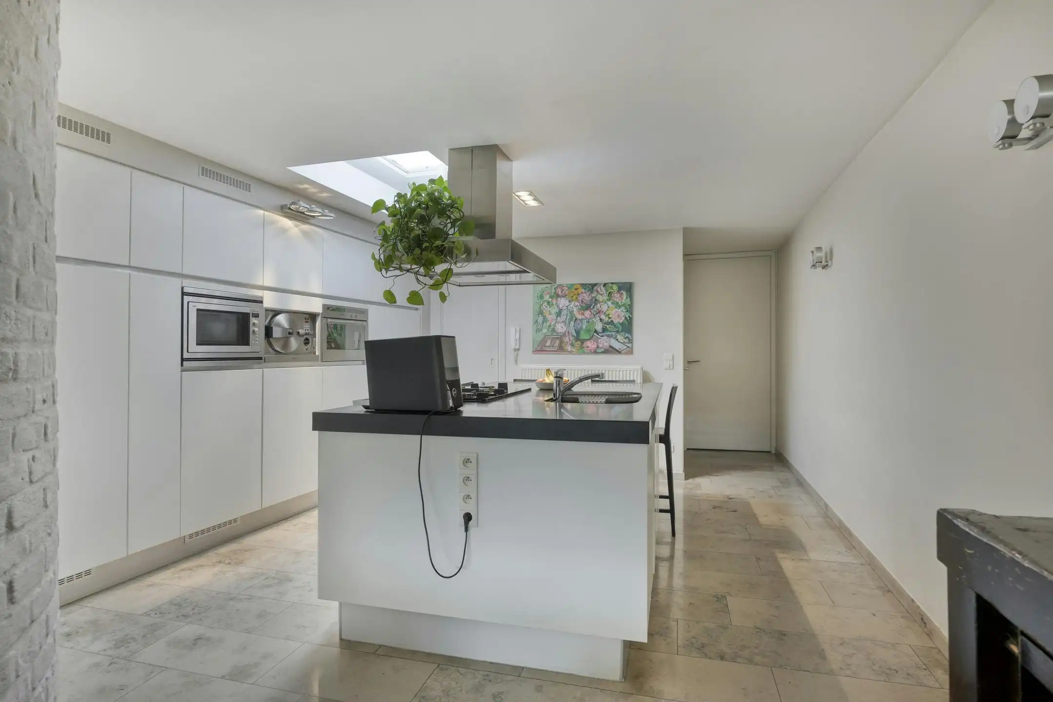 Stijlvolle stadswoning met handelspand te koop in hartje Maaseik foto 15