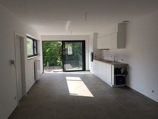 Instapklare woning met 2 slk, terras en tuintje foto 2
