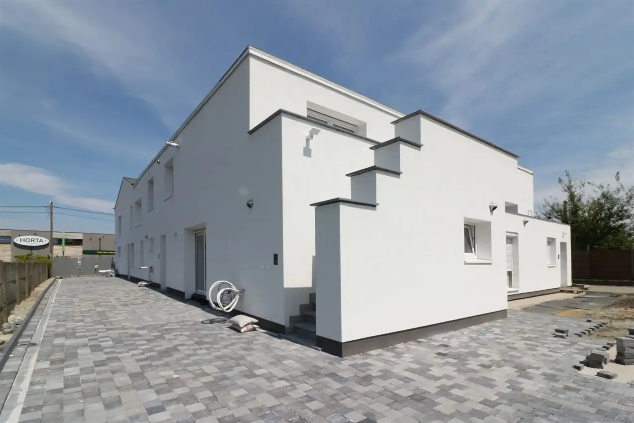 Gunstig gelegen, vernieuwd app. met 3 slpk., 2 badk. en garage foto 37