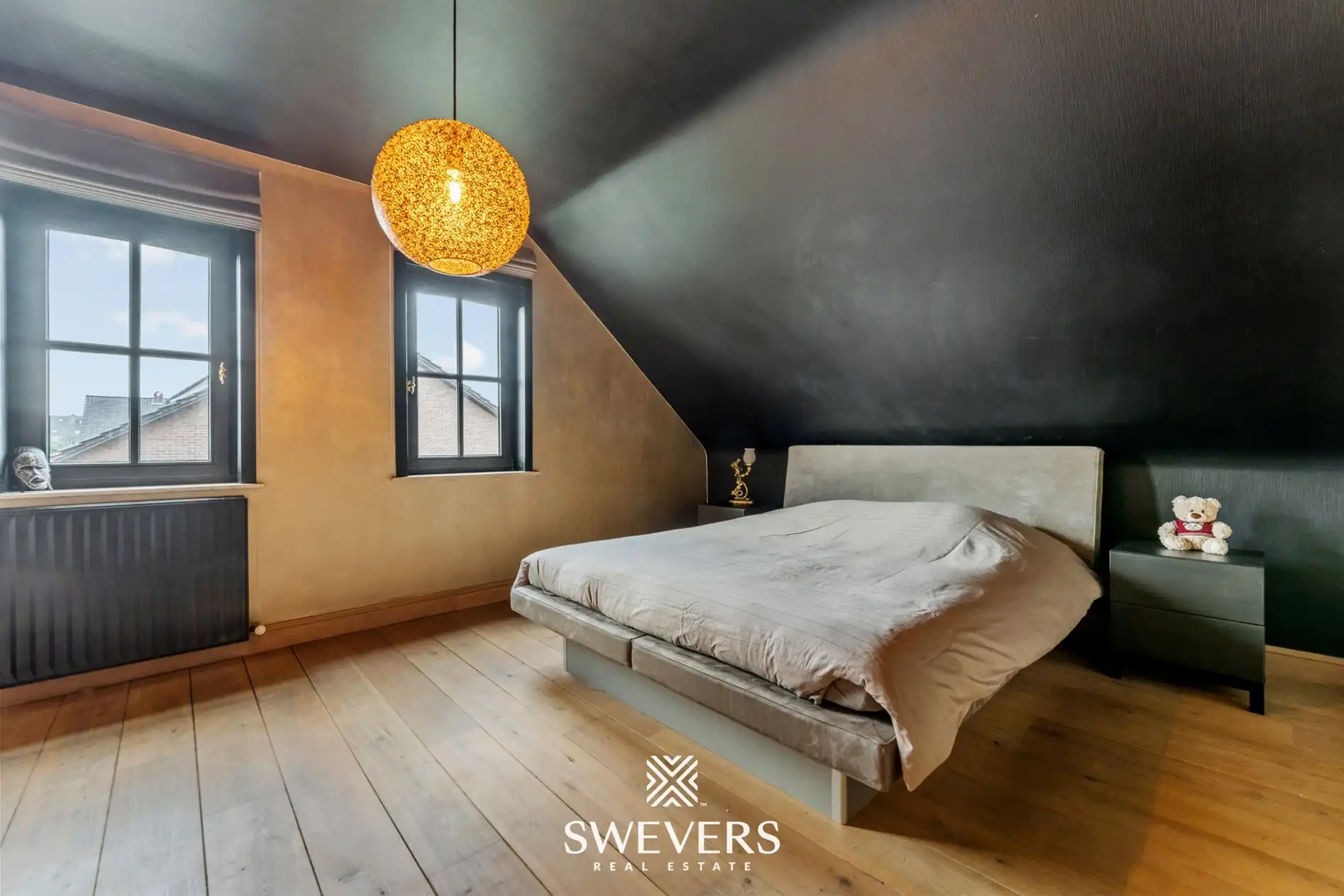 Ruime open bebouwing met 4 slaapkamers en zonnige tuin in Houthalen foto 19