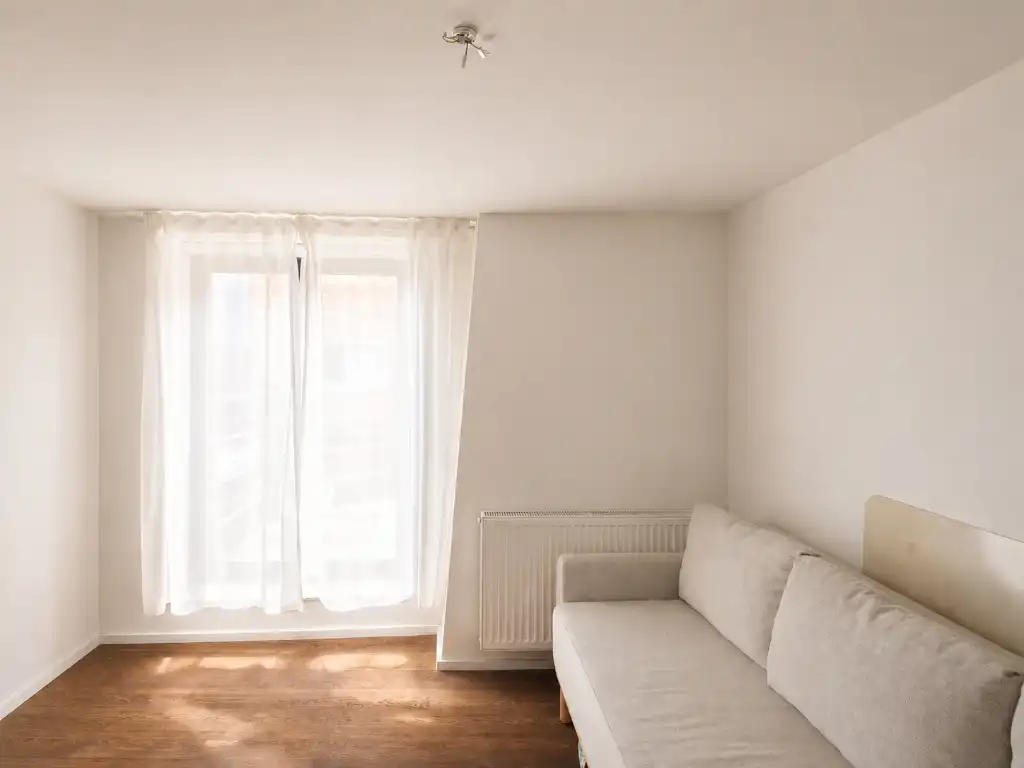 Stijlvol duplex appartement met 2 slaapkamers en terras, centraal gelegen in het bruisende centrum nabij alle belangrijkste straten en pleinen van Gent. foto 11