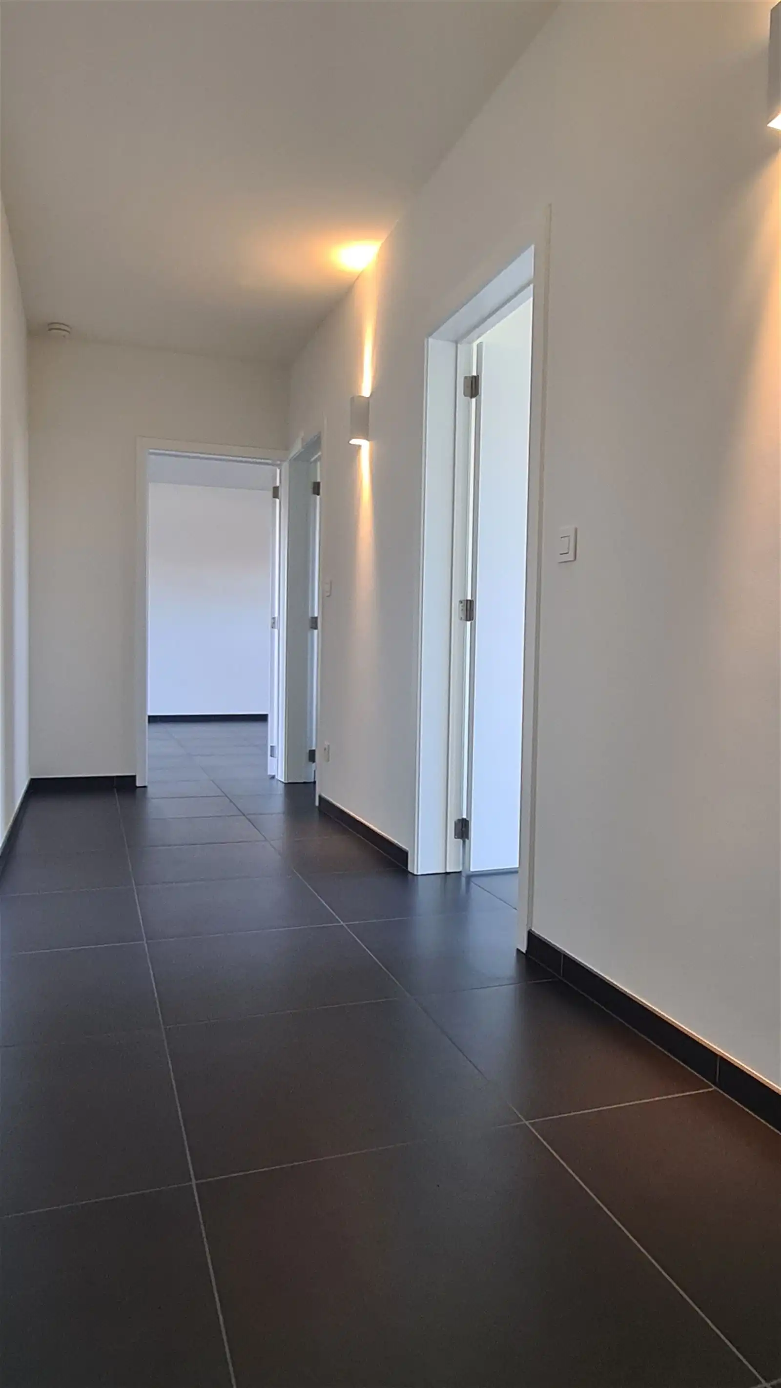 Recent appartement op bovenste verdieping nabij centrum Hoeselt foto 11