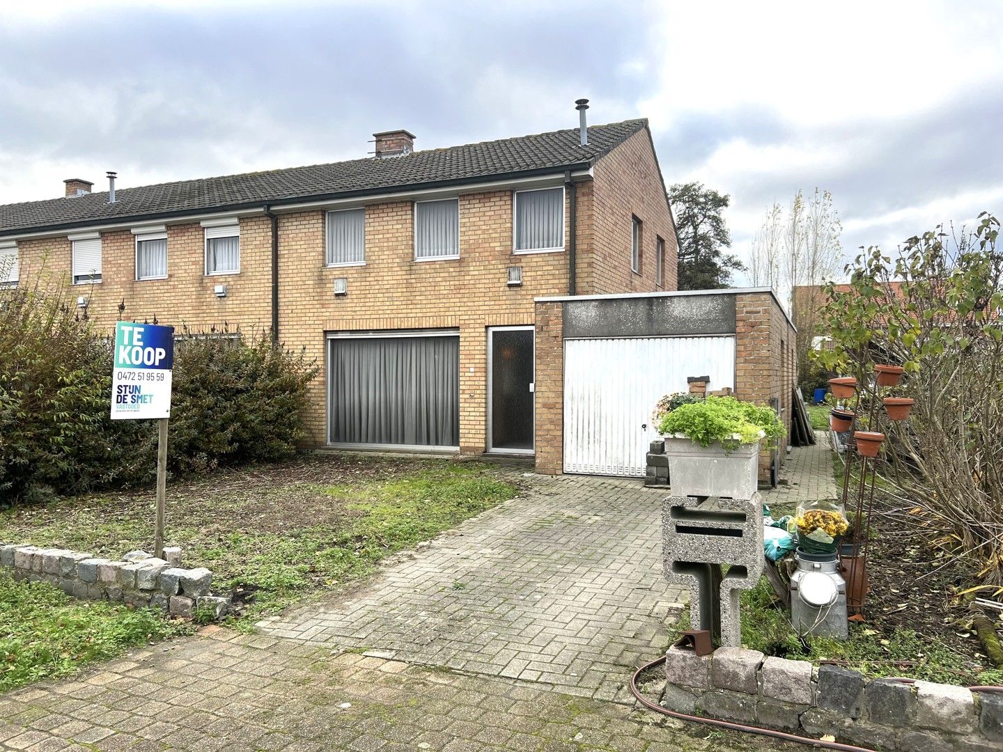 Halfopen woning met zonnige tuin foto 4