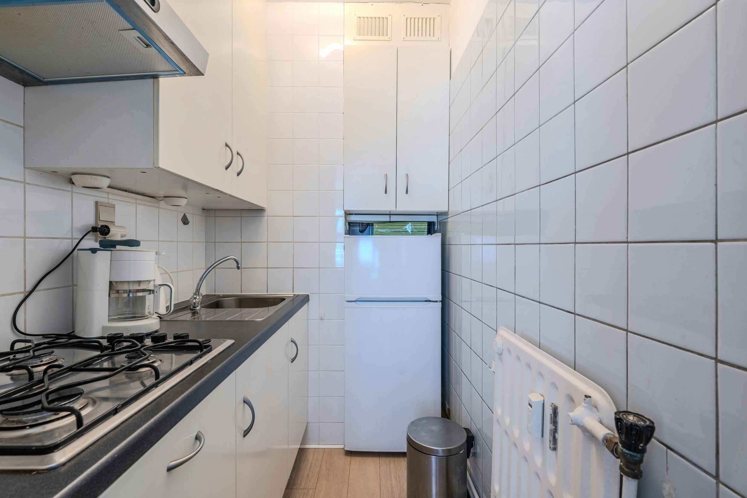 Lichtrijke studio te koop met zijdelings zeezicht en terras! foto 8