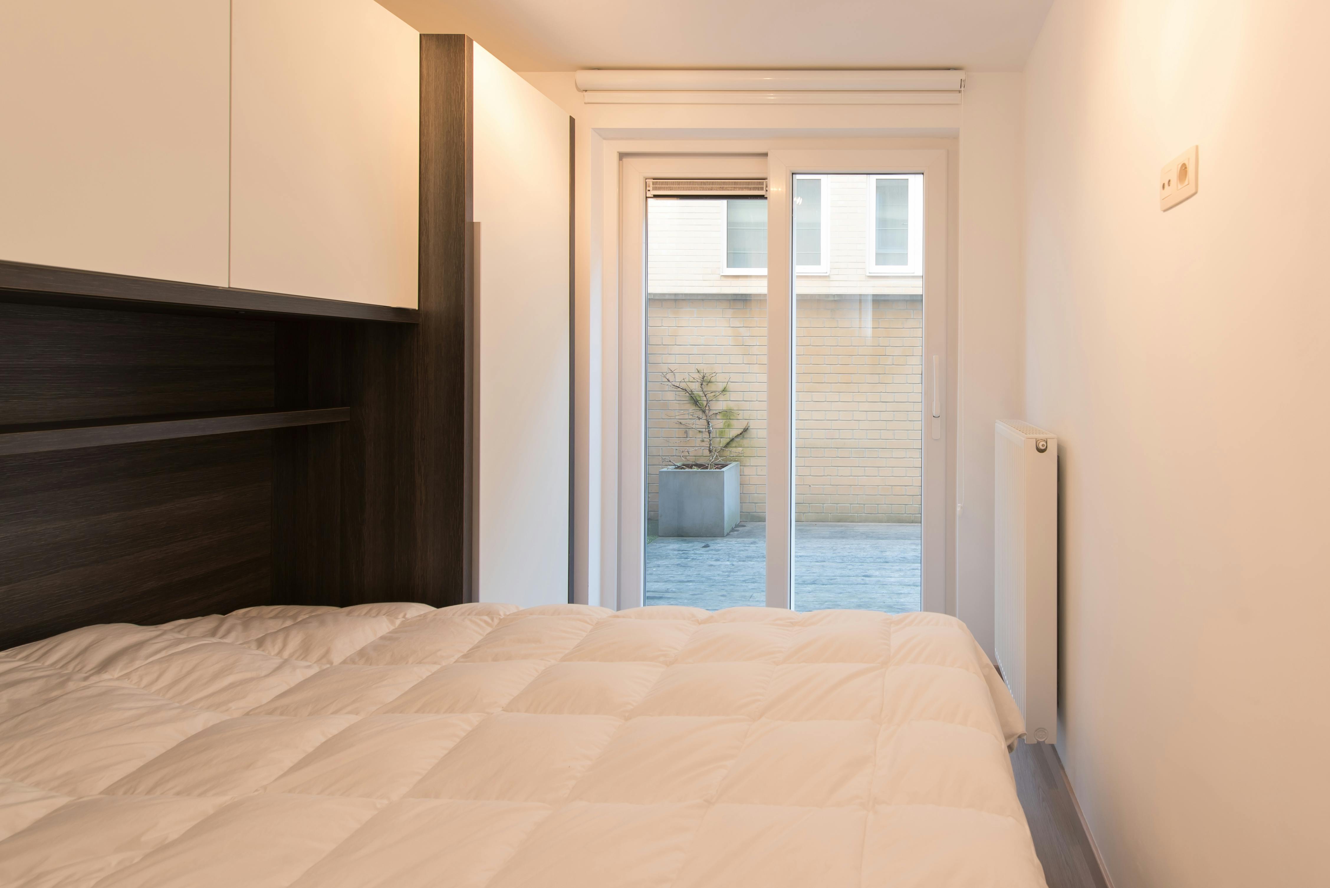 Recent gelijkvloers appartement met 2 slaapkamers en terras! foto 9