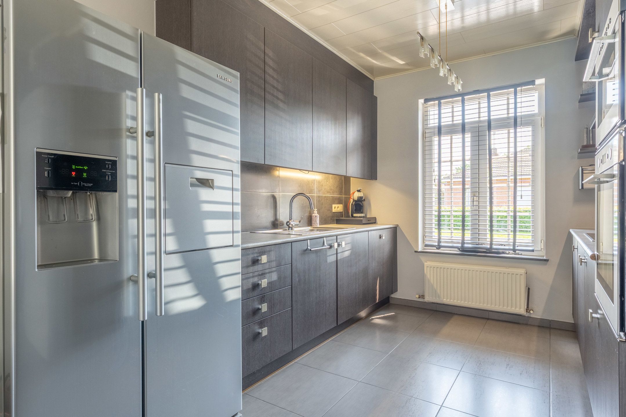Instapklare woning met 3 grote slpks en garage foto 6