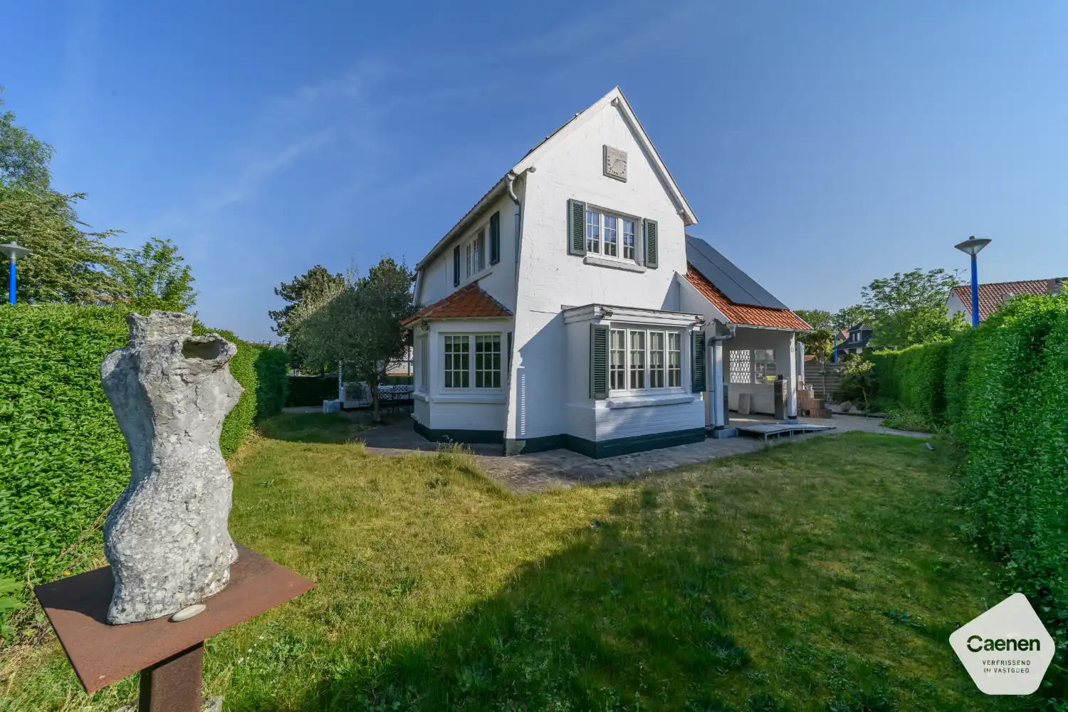 Alleenstaande hoekvilla met zongerichte tuin nabij zee – Koksijde foto 12