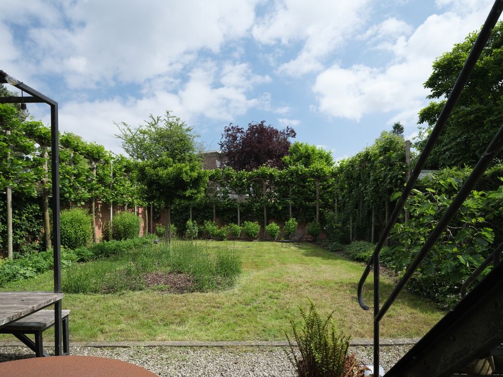 Kwalitatieve design bel-étage met 3 slaapkamers (mogelijkheid tot 5), bureauruimte en goed georiënteerde tuin te Sint-Amandsberg. foto 13