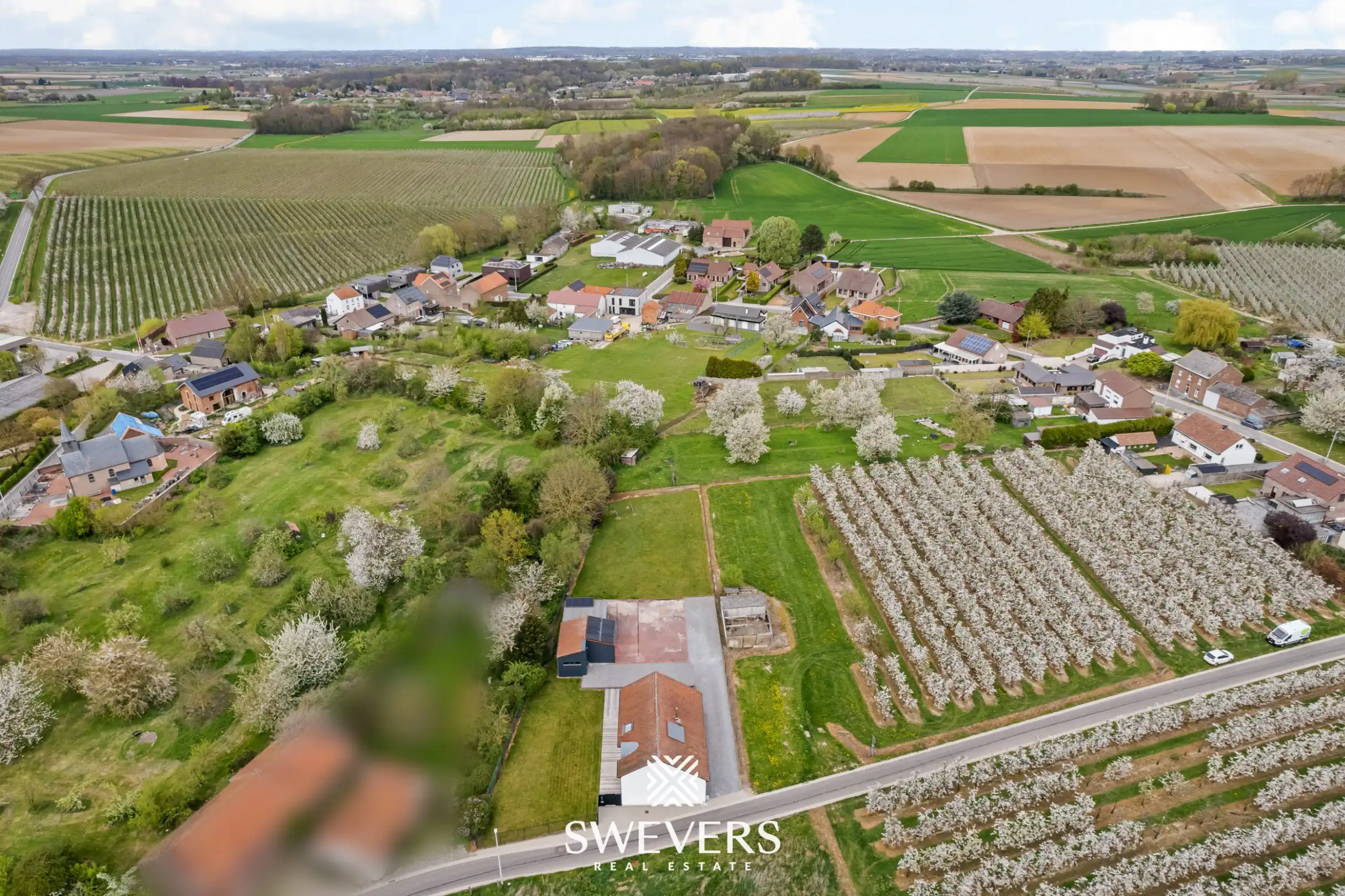 Instapklare open bebouwing met ruime tuin en prachtig uitzicht tussen de boomgaarden in Gingelom foto 41