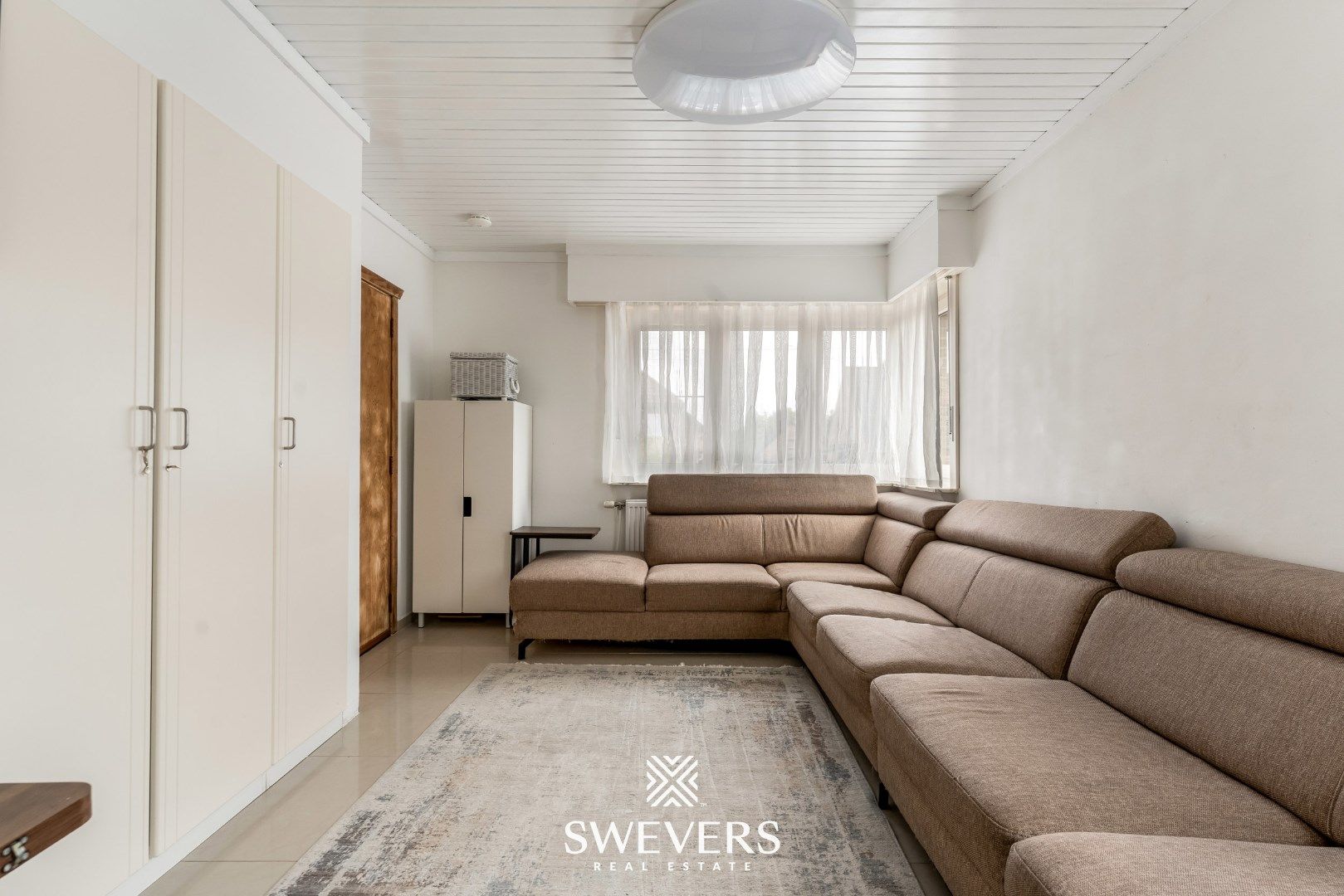 Unieke kans in Beverlo: ruime woning met loods, 5 slaapkamers en 2 badkamers foto 2