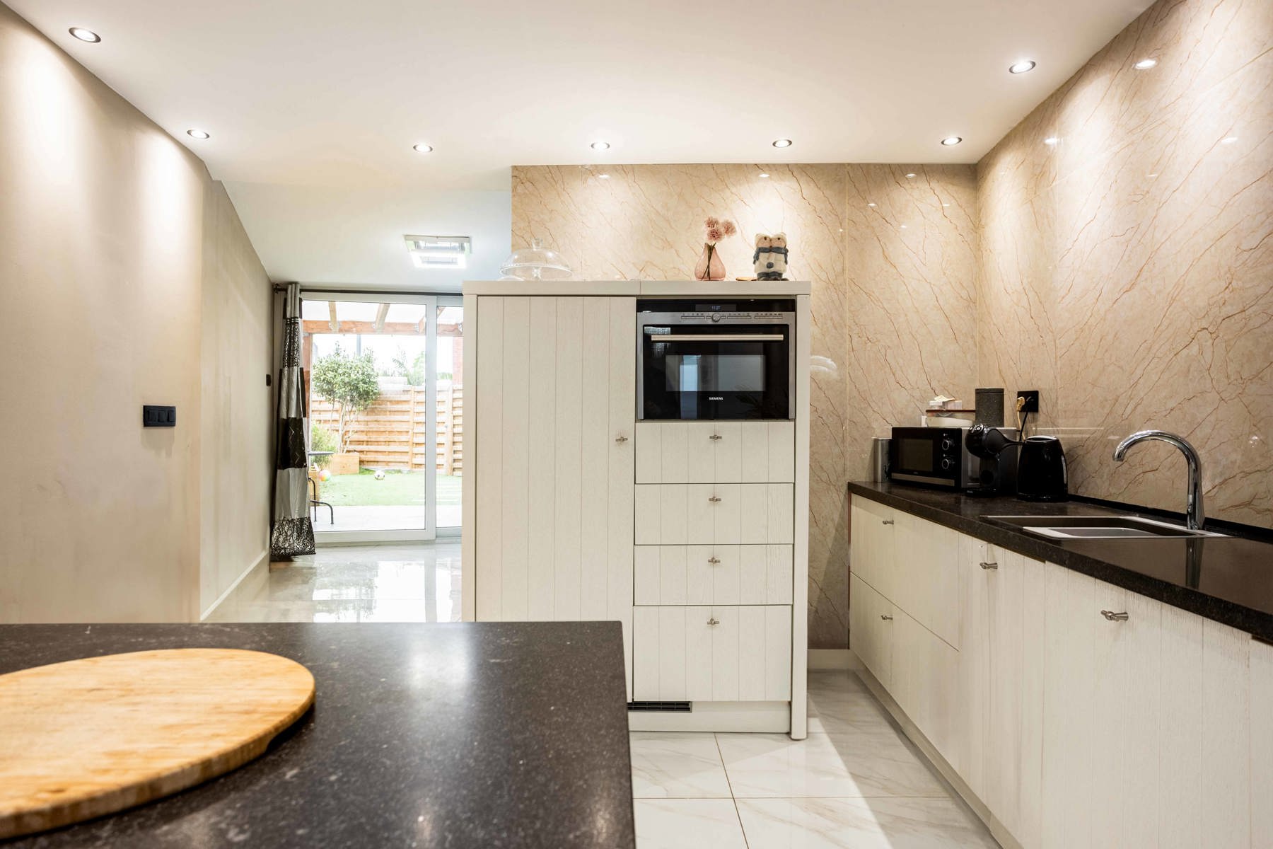 Gerenoveerde stadswoning met tuin en 3 SLP foto 8