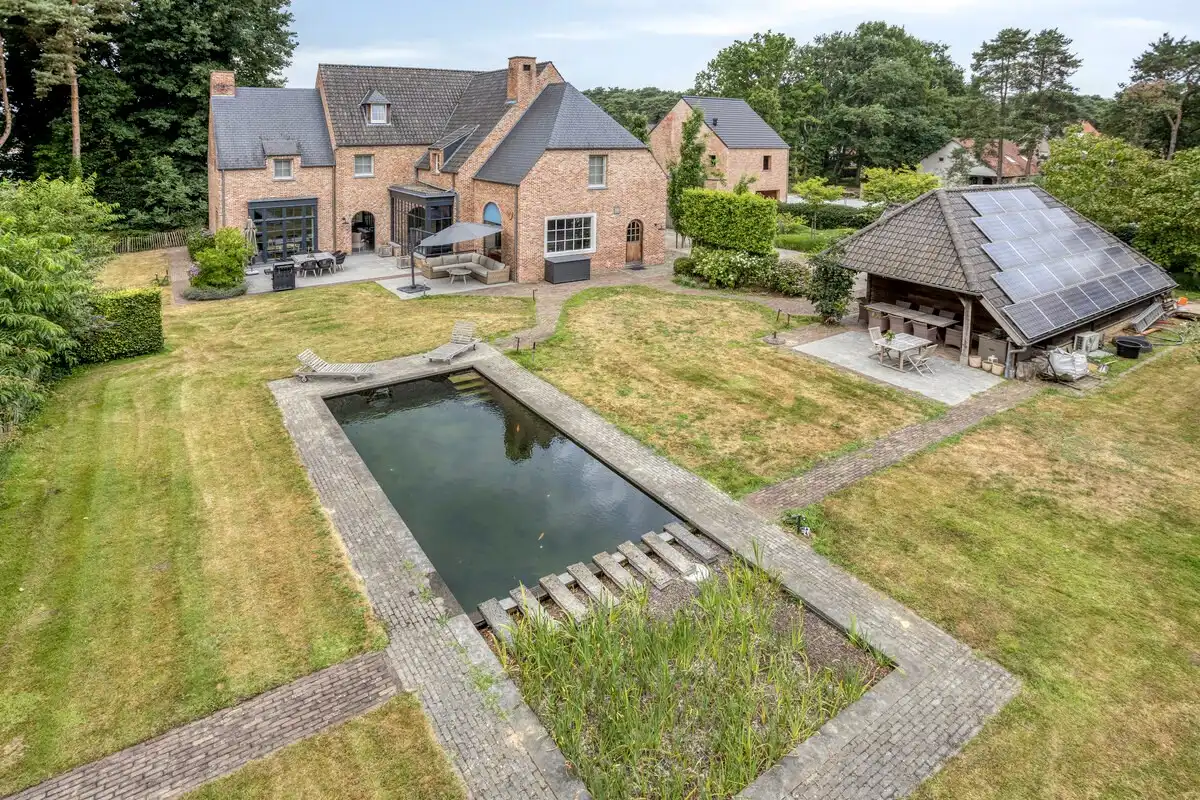 Exclusieve villa met oa 5 slaapkamers en verwarmde zwemvijver  op 2.070 m². foto 41