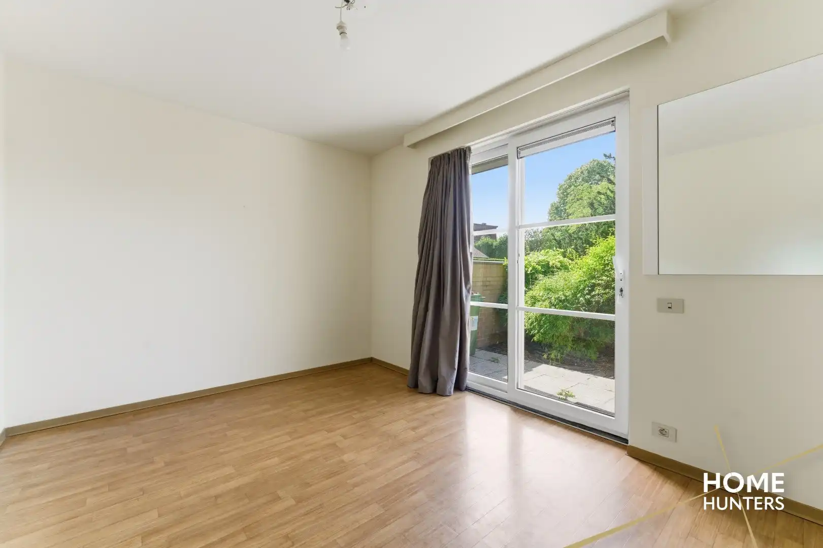 Instapklaar gelijkvloers appartement met 2 slaapkamers en ruime tuin foto 18