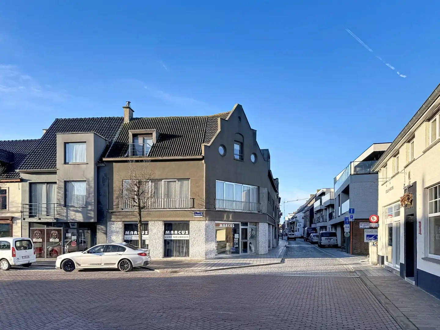 Opbrengsteigendom bestaande uit 3 appartementen + handelsgelijkvloers gelegen in het centrum foto 3
