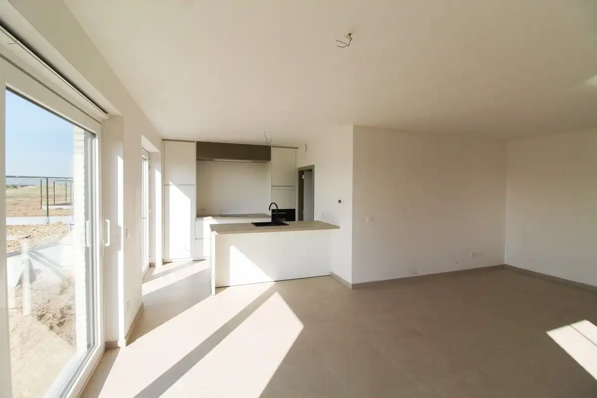 Halfopen nieuwbouwwoning met garage Roeselare foto 2