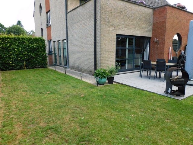 Tof appartement met tuin en garage foto 12