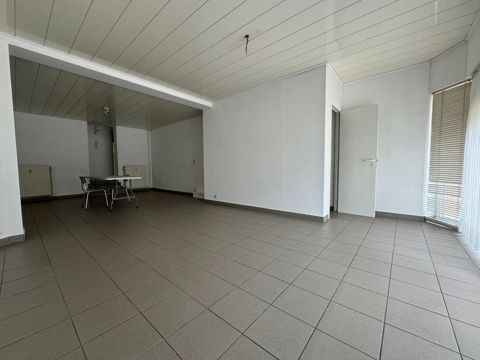 Opbrengsteigendom 2 appartementen en 2 commerciële ruimtes foto 33