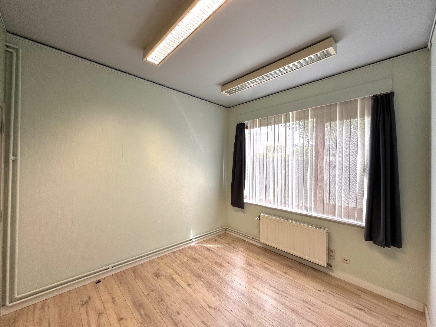 Ruim gelijkvloers appartement met 3 slaapkamers in Mal (Tongeren) foto 8