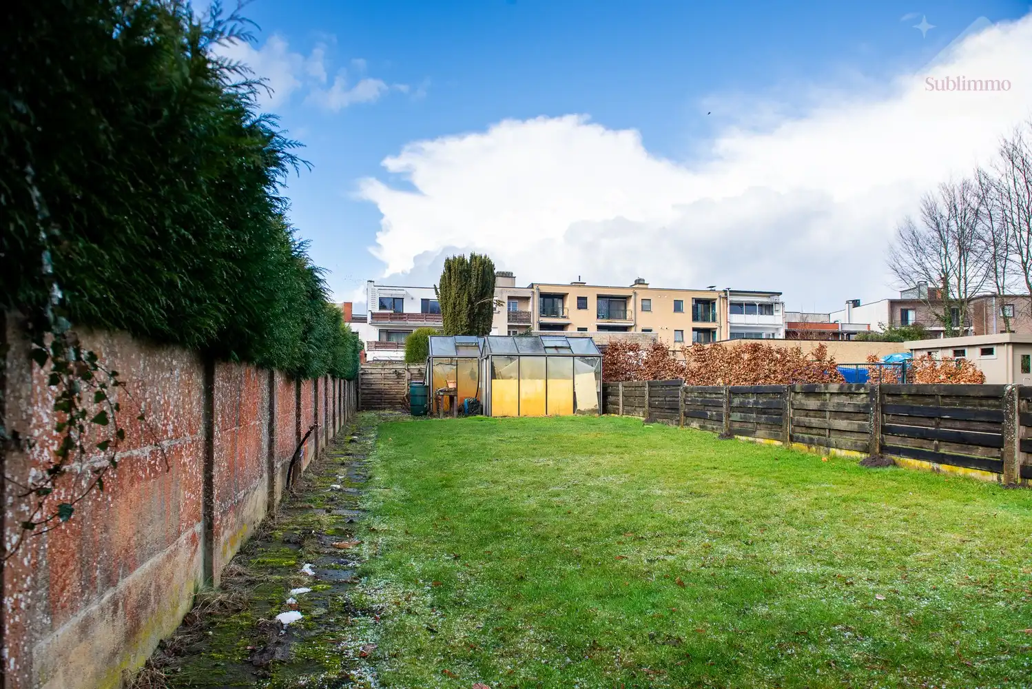 Opbrengsteigendom met 2 appartementen, tuin en garages te koop in Mol centrum foto 38